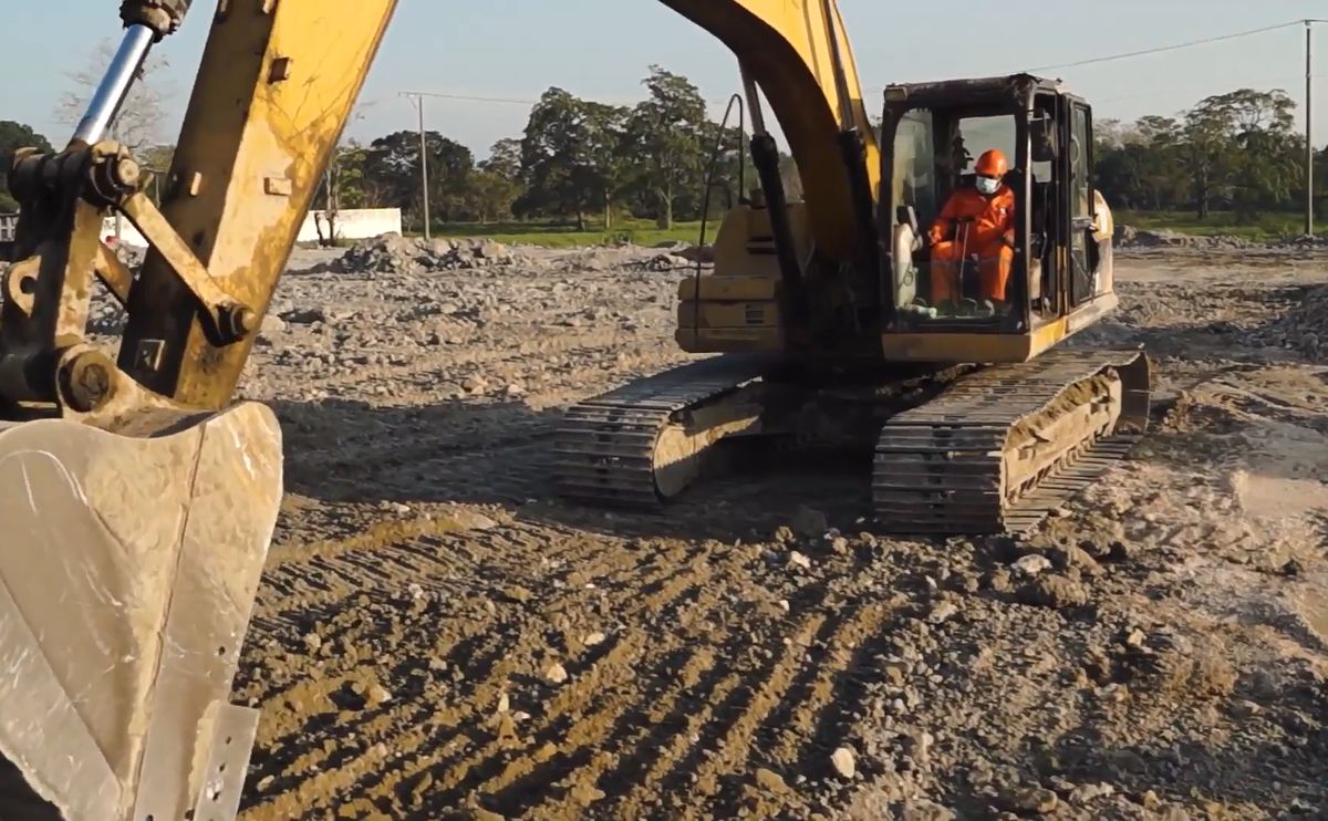 CCT excavator and operator at work on an earthworks site